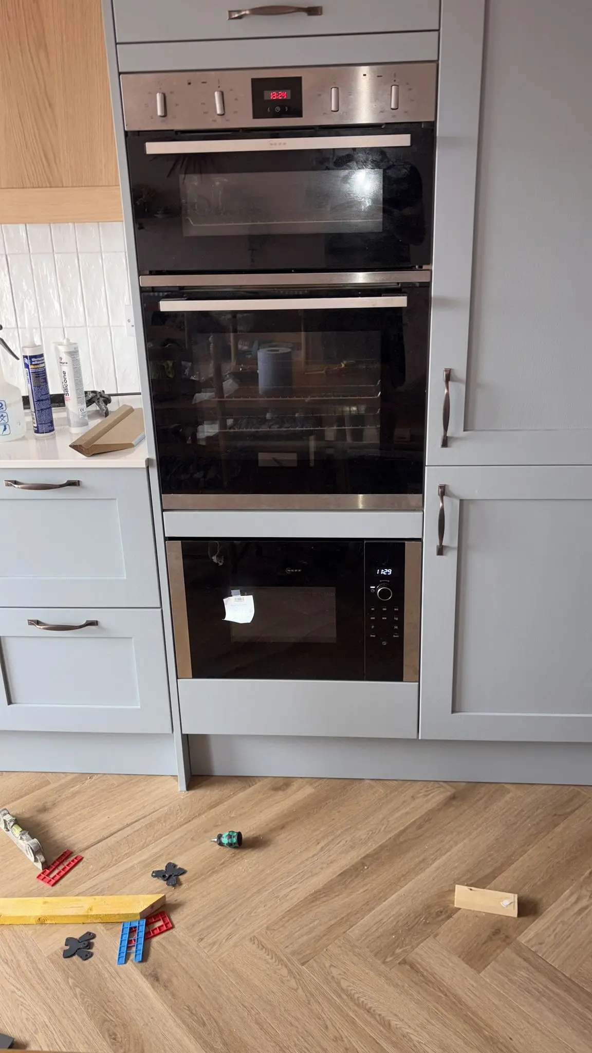 Close-up of the double oven and microwave in their housing